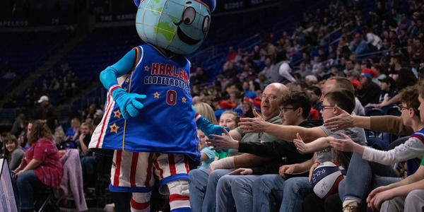 Harlem Globetrotter mascot interacts with fans in 2020